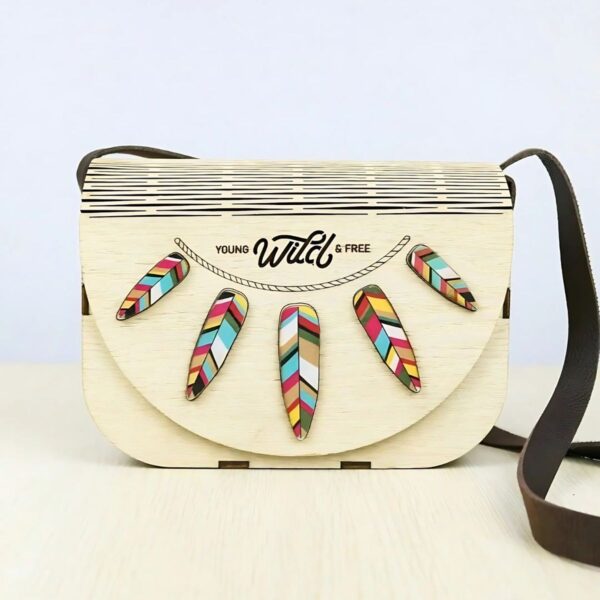 handmade wooden bag with stylized leaf motif