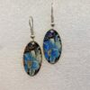 single earrings for women with oval shape and blue flower swirl pattern