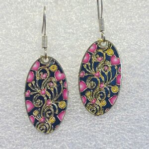 single earrings for women with oval shape and pink heart swirls pattern