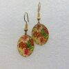 single earrings for women with oval shape and red tropical cluster pattern