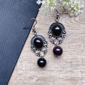 stone earrings for women with black filigree oval pattern