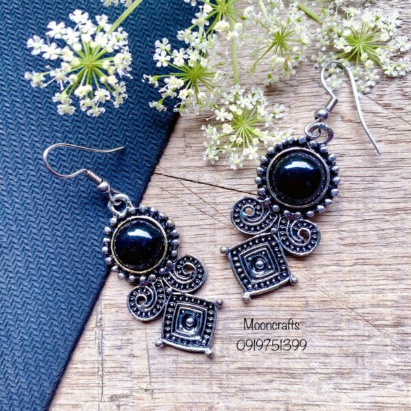 stone earrings for women with black spiral square pattern